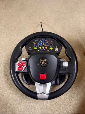 Lamborghini Black Steering Wheel with Red Accent Buttons